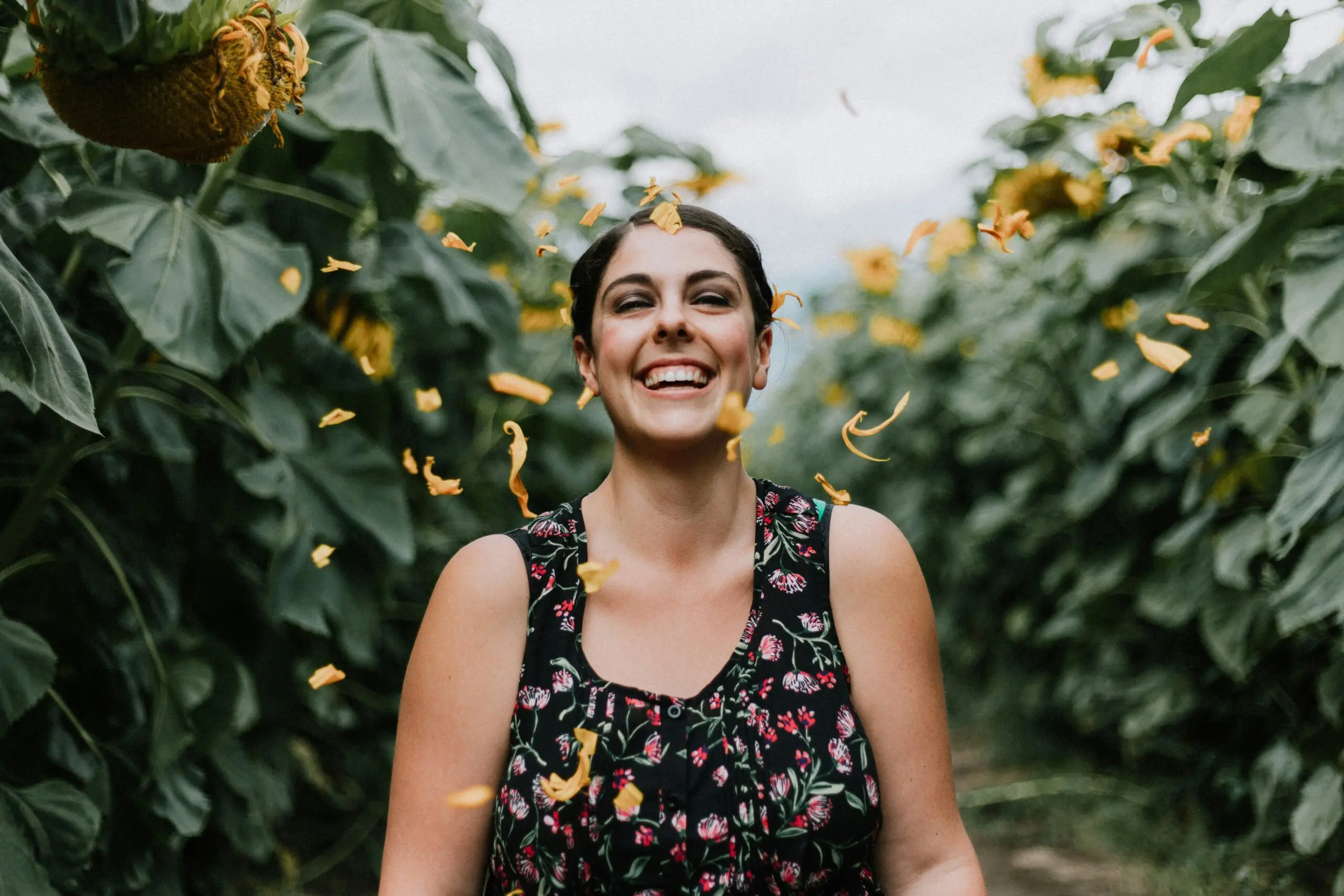 Woman laughing in blossoms